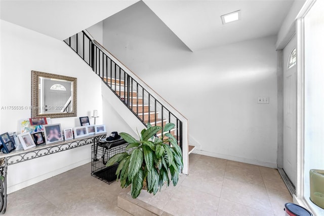 13190 SW 10th Terrace Dr Unit 13190, Miami, FL 33184 - staircase with baseboards and tile patterned floors