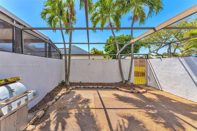 13190 SW 10th Terrace Dr Unit 13190, Miami, FL 33184 - view of patio / terrace with fence and a lanai
