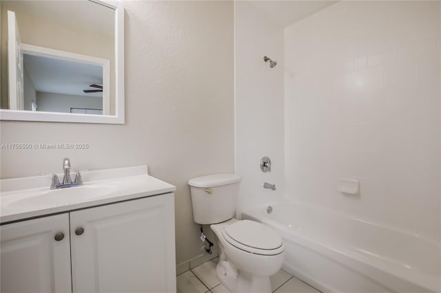 bathroom with toilet, tile patterned flooring, bathtub / shower combination, and vanity