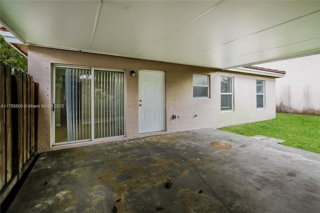 view of patio featuring fence