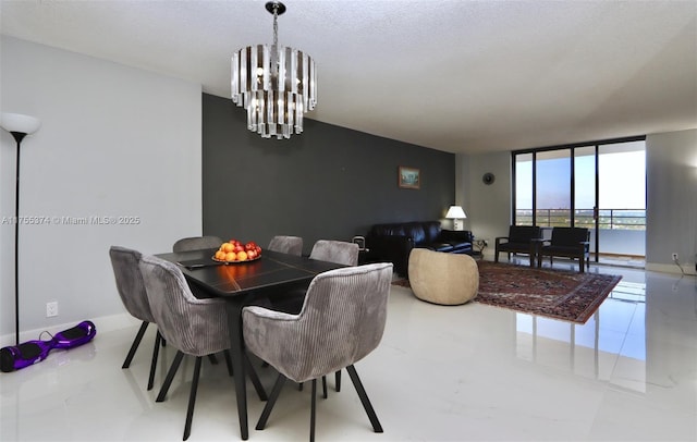 dining space featuring an inviting chandelier, expansive windows, baseboards, and a textured ceiling