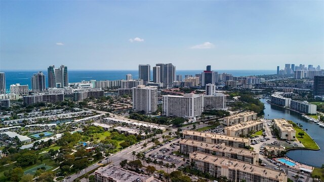 bird's eye view with a view of city and a water view