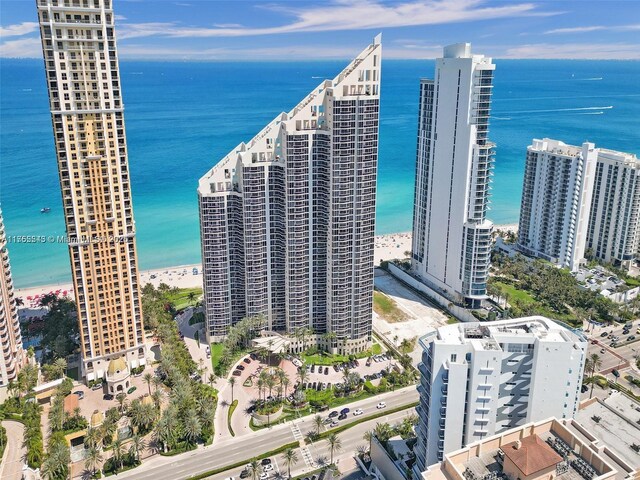 aerial view featuring a water view and a city view