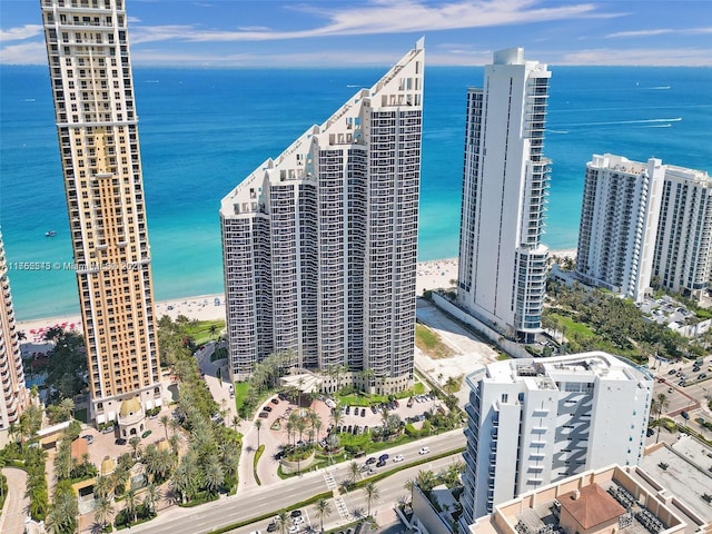 drone / aerial view with a water view and a city view