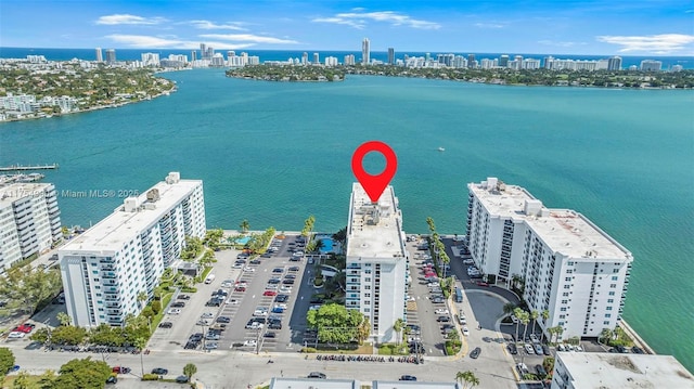 aerial view with a water view and a view of city