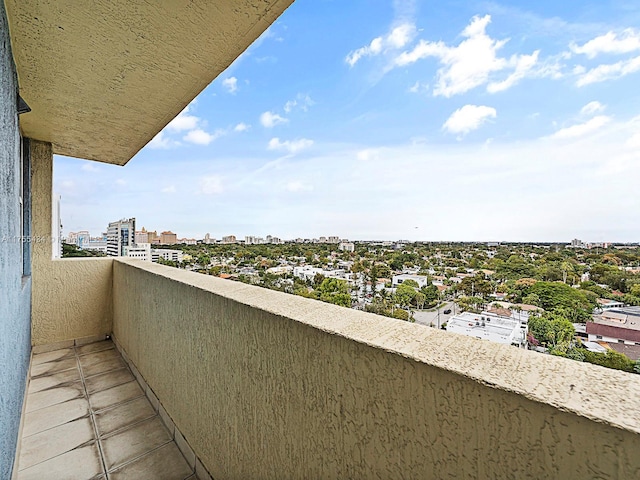 balcony featuring a city view