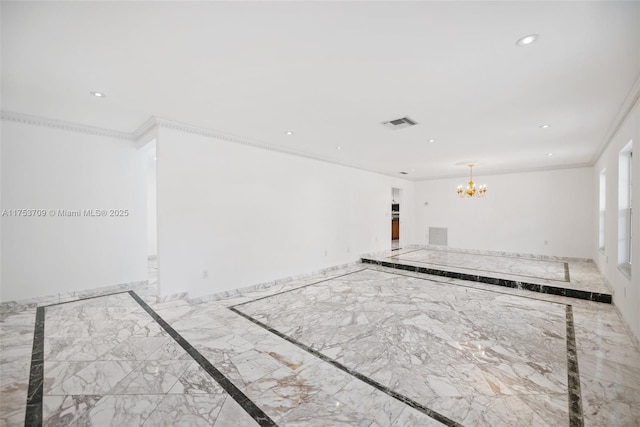 empty room with visible vents, marble finish floor, crown molding, a chandelier, and recessed lighting