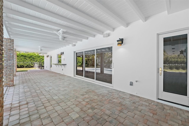 view of patio / terrace featuring ceiling fan