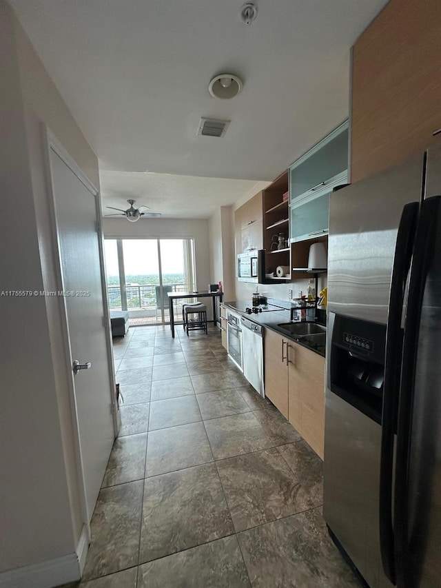 kitchen with ceiling fan, visible vents, appliances with stainless steel finishes, open shelves, and dark countertops