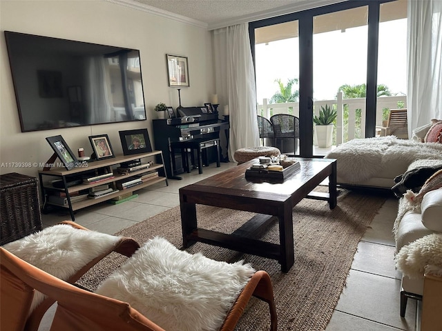 1121 Crandon Blvd Unit D404, Key Biscayne, FL 33149 - living room featuring a textured ceiling, a wall of windows, light tile patterned floors, and ornamental molding