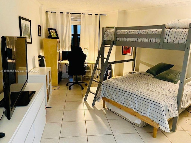 1121 Crandon Blvd Unit D404, Key Biscayne, FL 33149 - bedroom featuring light tile patterned floors and ornamental molding