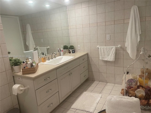 1121 Crandon Blvd Unit D404, Key Biscayne, FL 33149 - bathroom featuring tile patterned flooring, tile walls, and vanity