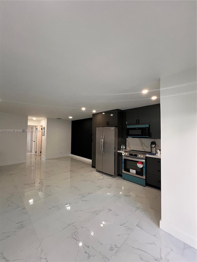 kitchen with marble finish floor, stainless steel appliances, recessed lighting, light countertops, and modern cabinets