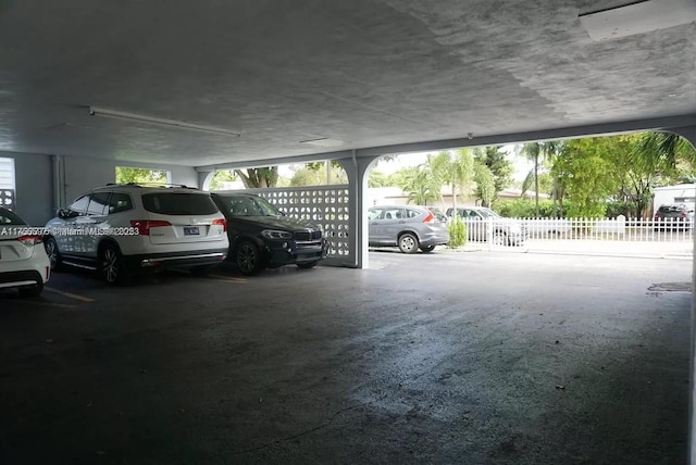 parking garage featuring fence