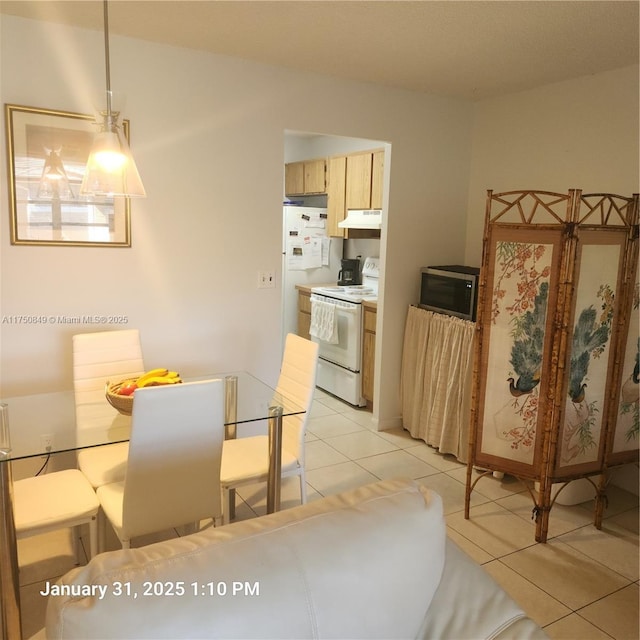 10004 Twin Lakes Dr Unit 36-F, Coral Springs, FL 33071 - dining area with light tile patterned flooring