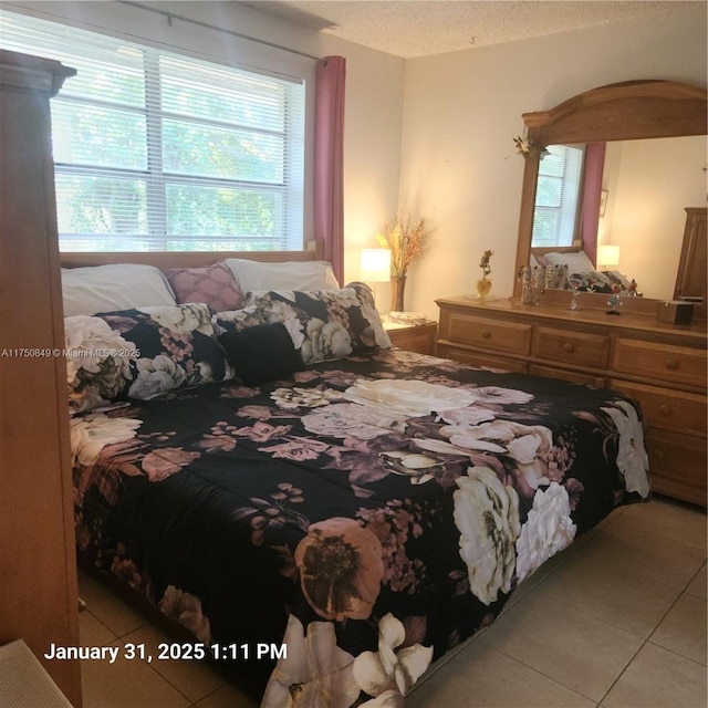 10004 Twin Lakes Dr Unit 36-F, Coral Springs, FL 33071 - tiled bedroom with a textured ceiling