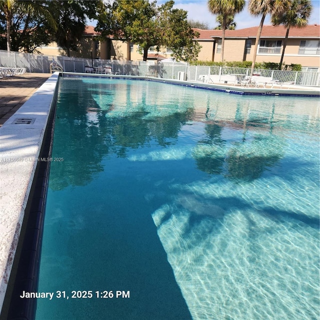 10004 Twin Lakes Dr Unit 36-F, Coral Springs, FL 33071 - pool with fence