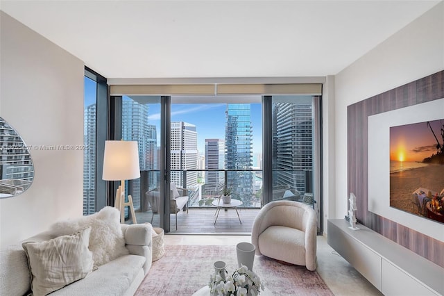 living area featuring floor to ceiling windows and a city view