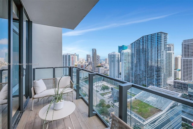 balcony featuring a city view