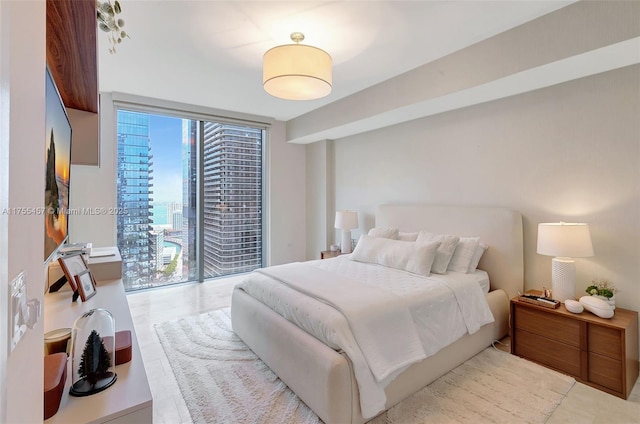 88 SW 7th St Unit 3003, Miami, FL 33130 - bedroom featuring access to outside and expansive windows