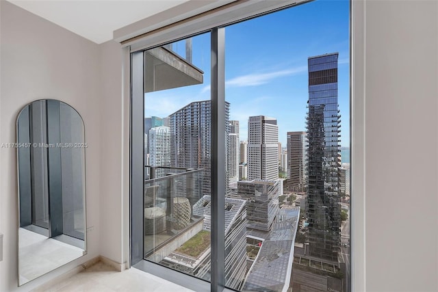 88 SW 7th St Unit 3003, Miami, FL 33130 - interior space with a city view and baseboards