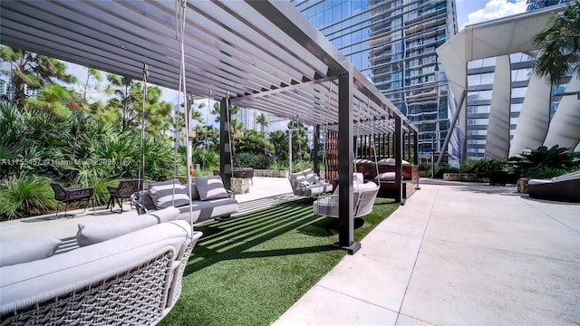 view of patio with outdoor lounge area and a pergola