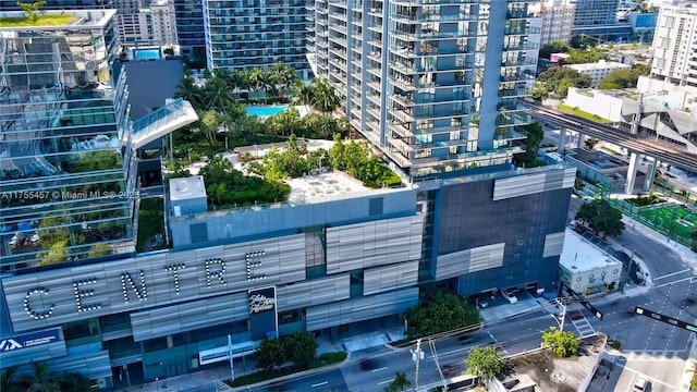 birds eye view of property featuring a view of city