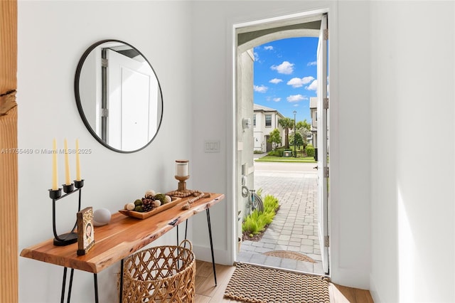 doorway featuring light wood finished floors