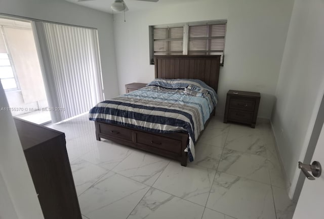 bedroom with marble finish floor and baseboards