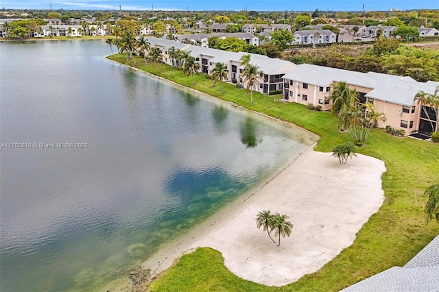 aerial view with a residential view and a water view
