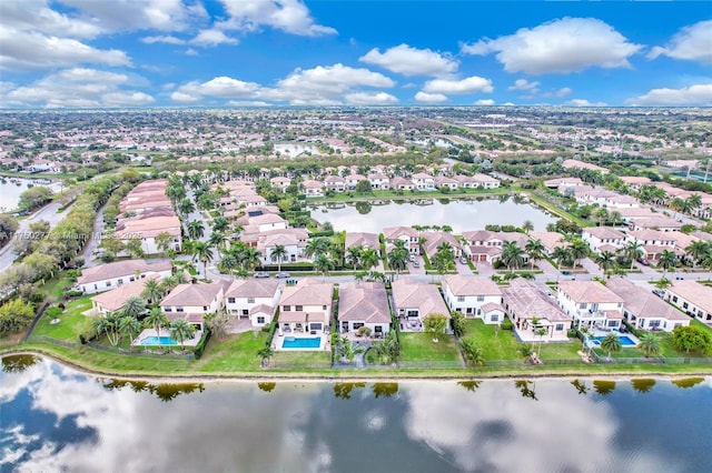 aerial view featuring a water view and a residential view