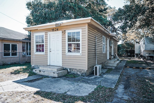 view of outdoor structure with fence