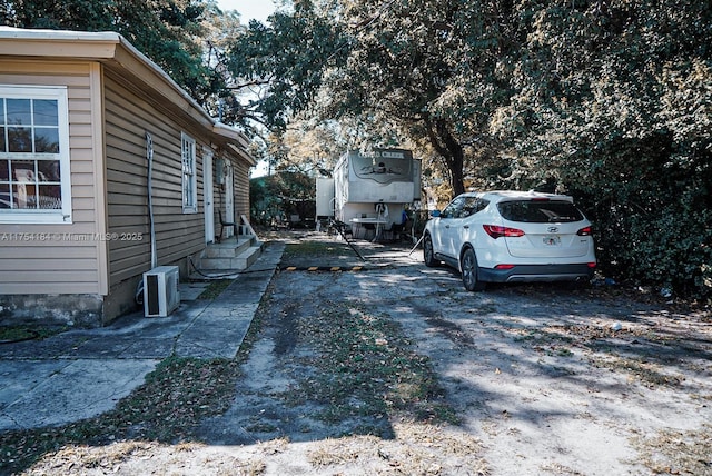 view of yard featuring entry steps