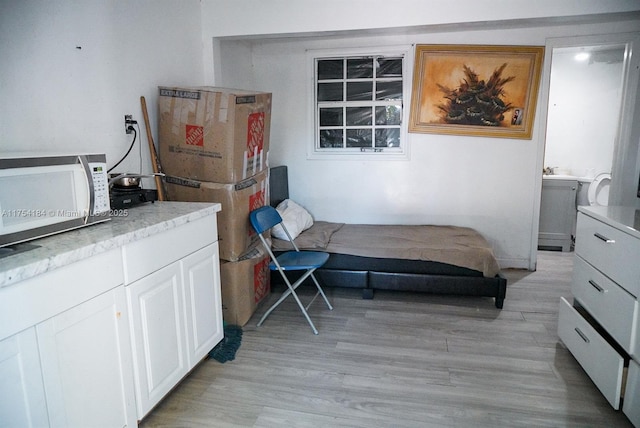 bedroom featuring light wood-type flooring