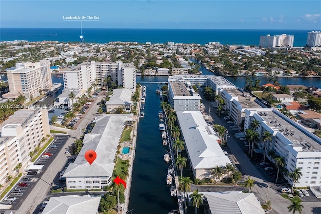 aerial view with a water view and a city view