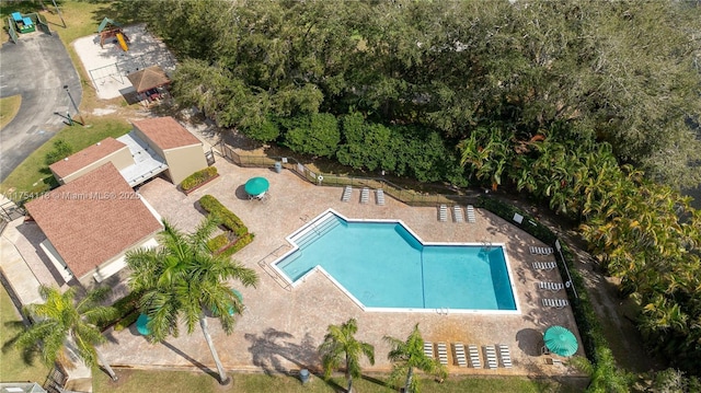 community pool featuring a patio area