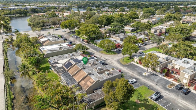 aerial view with a water view and a residential view