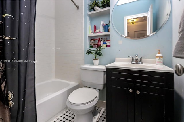 bathroom with vanity, toilet, and shower / bath combo with shower curtain