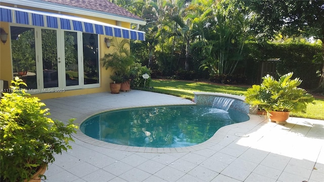 outdoor pool featuring a patio