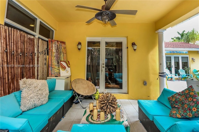 view of patio / terrace with french doors, a ceiling fan, and outdoor lounge area