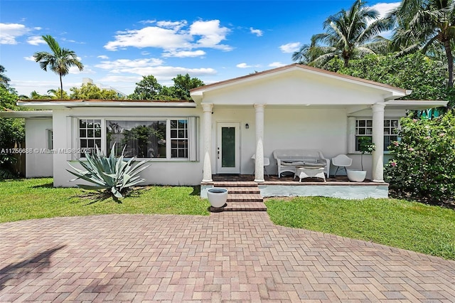 225 191st Ter, Sunny Isles Beach, FL 33160 - view of front facade featuring stucco siding