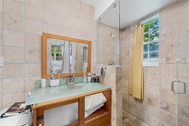 225 191st Ter, Sunny Isles Beach, FL 33160 - bathroom featuring tiled shower and vanity