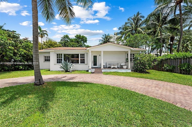 225 191st Ter, Sunny Isles Beach, FL 33160 - ranch-style house featuring stucco siding and decorative driveway