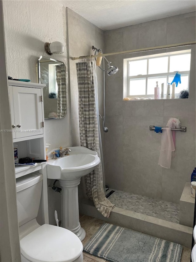 3611 SW 36th St, West Park, FL 33023 - bathroom featuring toilet and tiled shower
