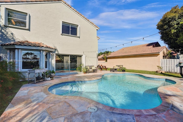 view of pool featuring a fenced in pool, a patio, and fence