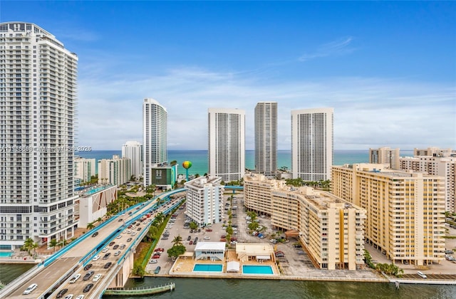 property's view of city with a water view