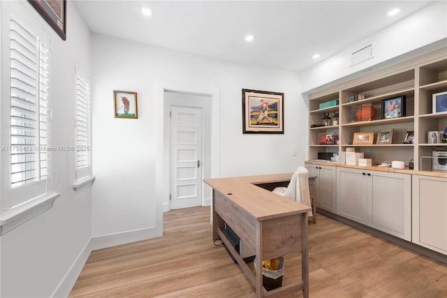 office with baseboards, recessed lighting, visible vents, and light wood-style floors