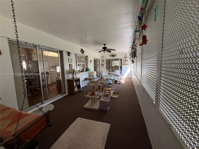 interior space featuring ceiling fan