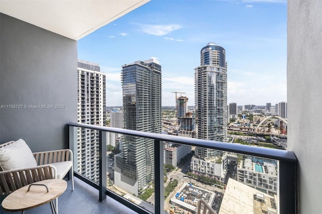 balcony featuring a view of city