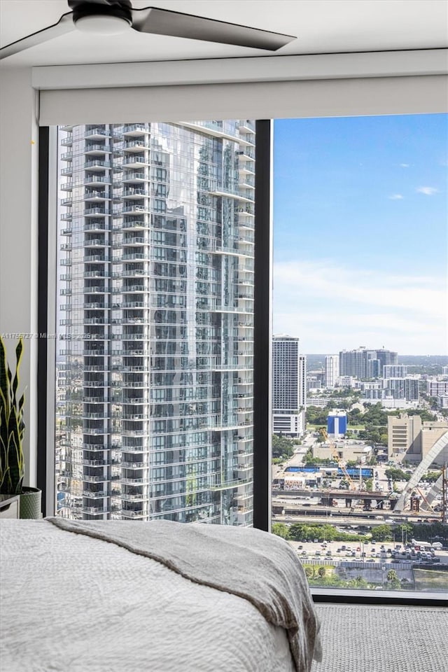 bedroom featuring a view of city